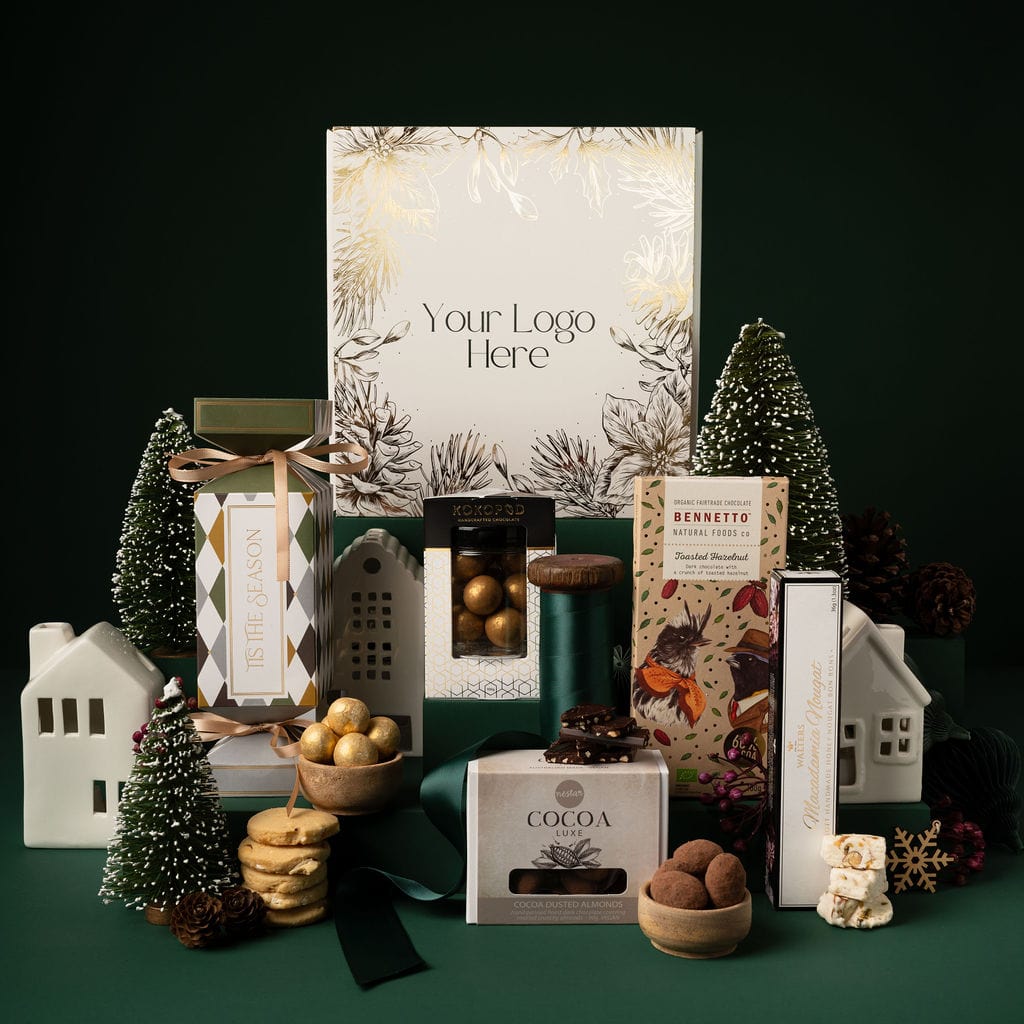 green themed christmas gift with gold packaging. includes chocolate, christmas bon bon nougat and snow flake ornament 
