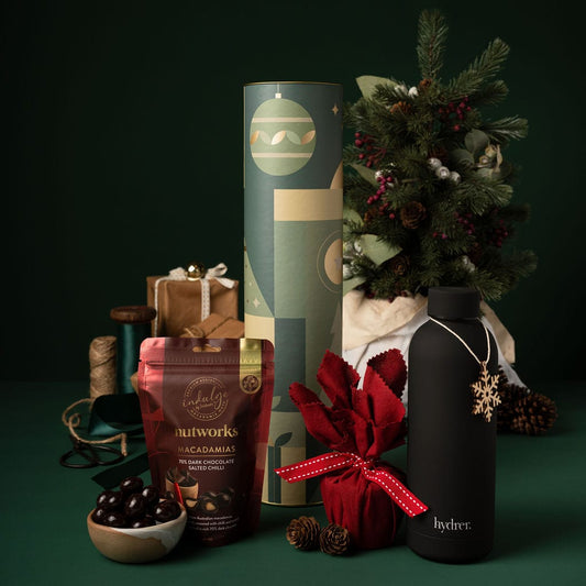 green themed christmas gift with chocolate and water bottle