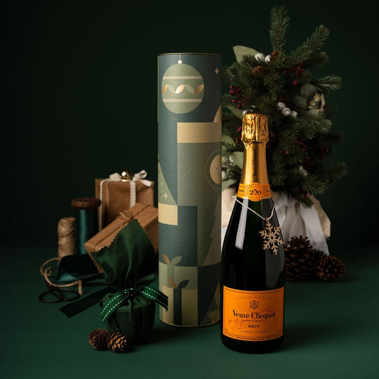 green christmas cylinder with veuve bottle and pudding 
