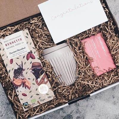 Ellar Boutique custom branded hotel and accommodation welcome gift - A collection of thoughtfully curated amenities, beautifully packaged in reusable packaging, showcasing the company's branding. 7